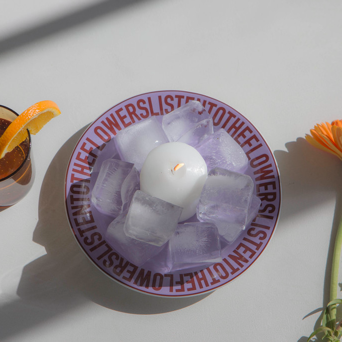 CERAMIC PURPLE PLATE WITH ICE AND A CANDLE